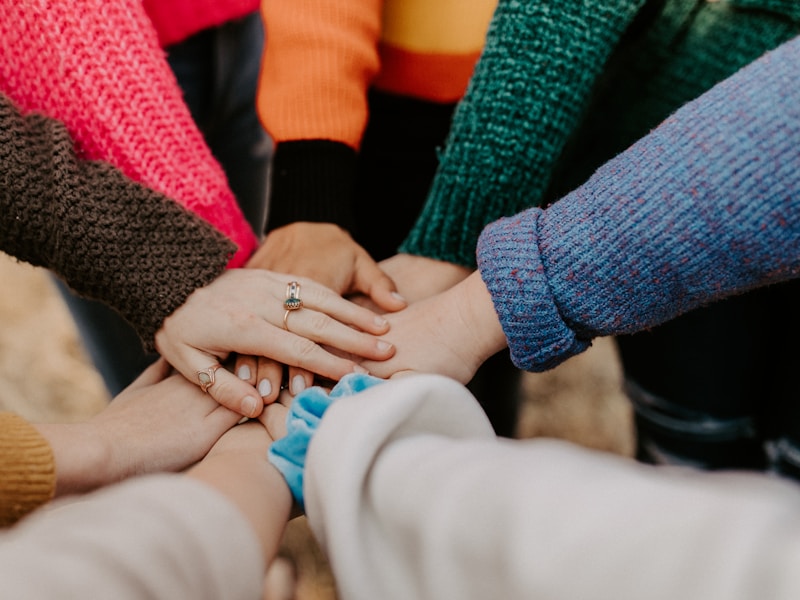 Hands reaching out in support - Building connections and community